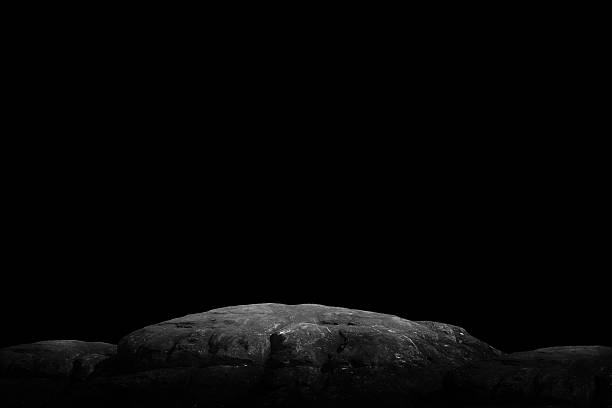 istock Stone podium on dark black background. 2218206891