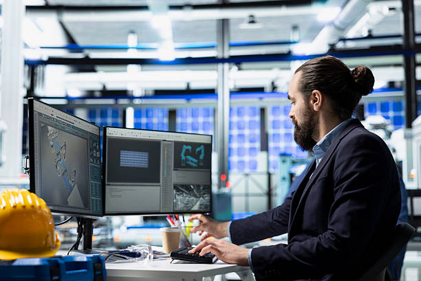 istock Male production worker in a solar panel plant conducts a routine inspection 2218214569