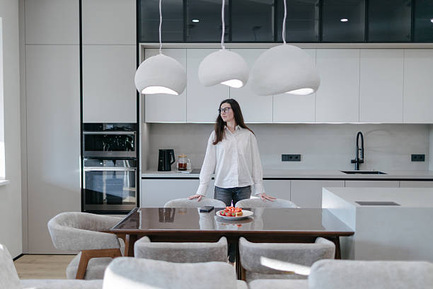 istock Woman in a modern house interior 2218216125