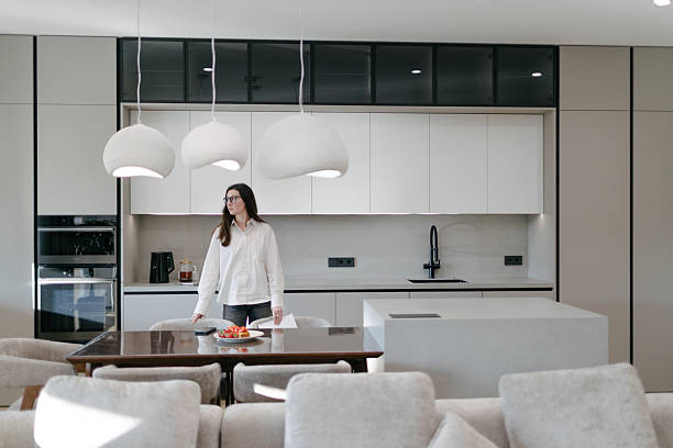 istock Woman in a modern house interior 2218216339