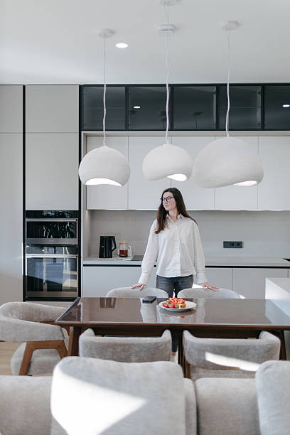istock Woman in a modern house interior 2218216405