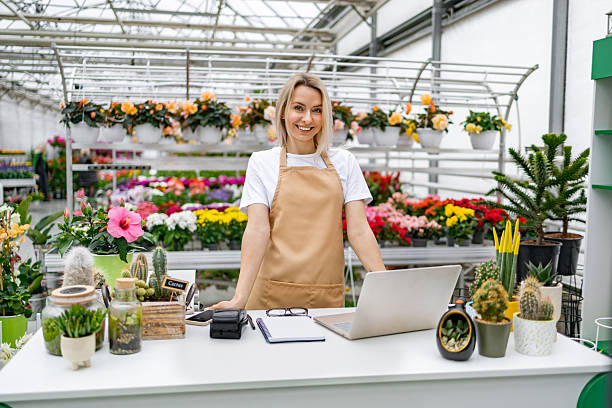 istock Florist At The Counter, Smiling 2218216837