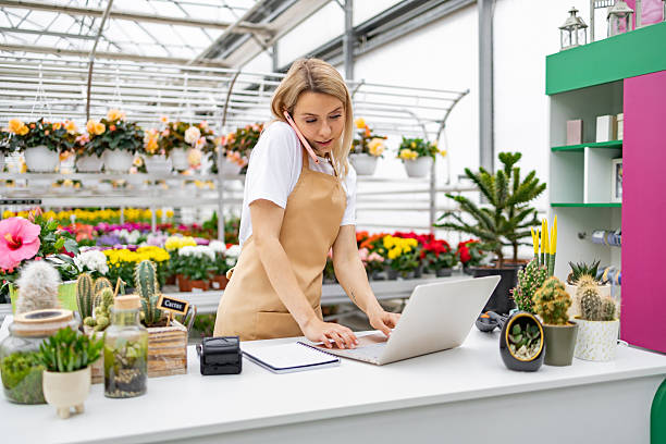 istock Florist Working, Talking on Phone 2218216916
