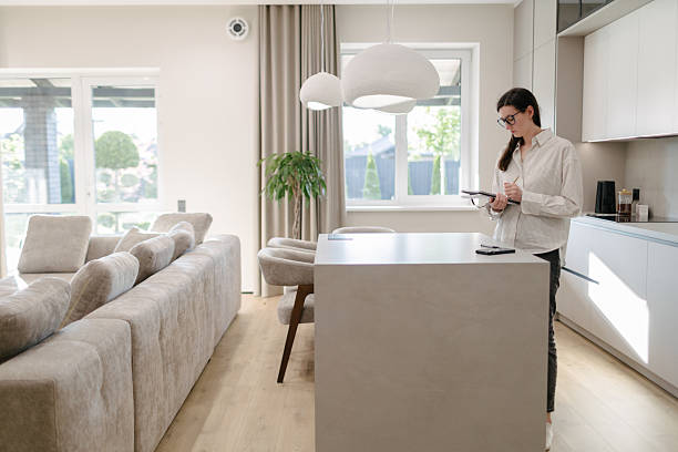 istock Woman in a modern house interior 2218218036
