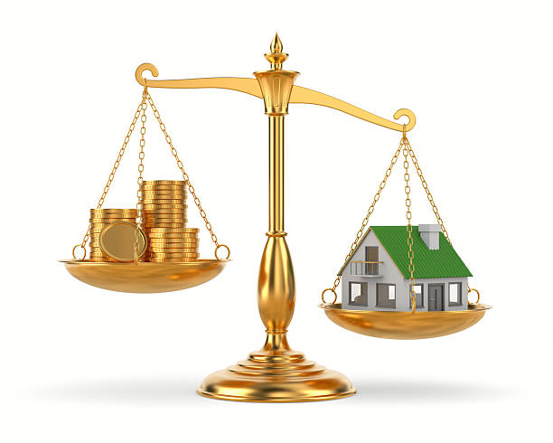 istock house and money on scale. Isolated 3D illustration on white background 2218220926
