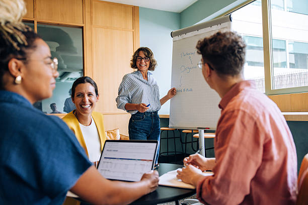 istock Team discussing strategies during a meeting in a modern office setting 2218221271