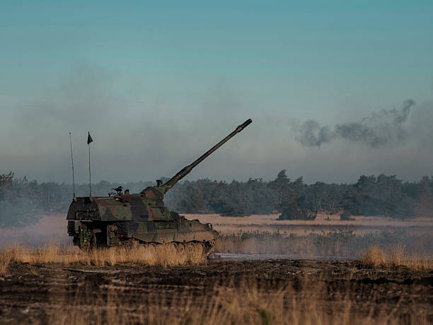 istock Panzerhaubitze 2000 in Smoky Battle Conditions During Live Fire 2218226899