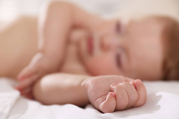 istock Cute little baby sleeping on bed, selective focus 2218228684