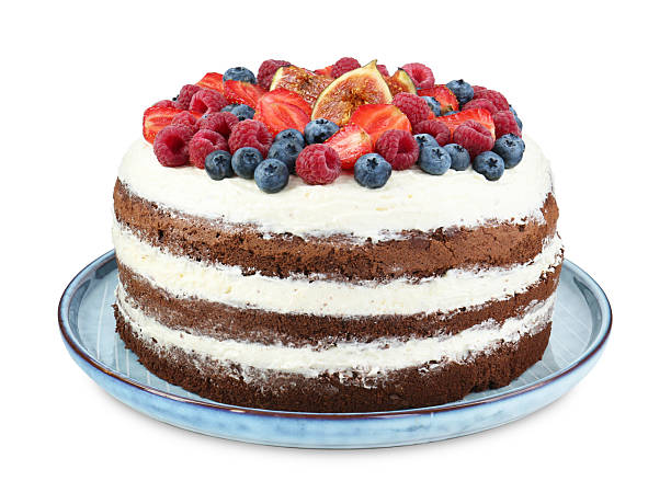 istock Delicious chocolate sponge cake with berries isolated on white 2218229053
