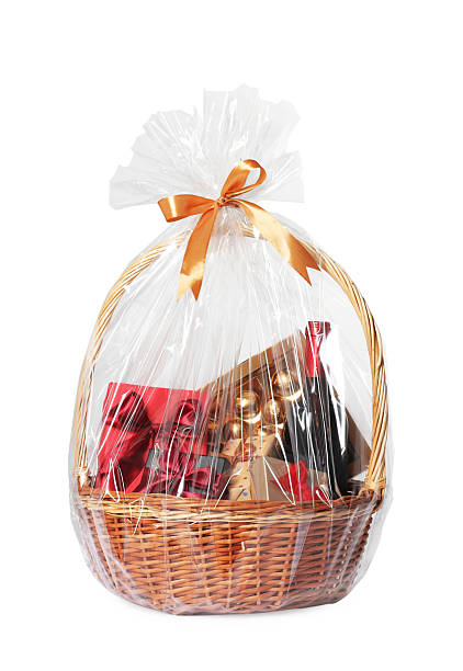istock Wicker gift basket with wine isolated on white 2218229855