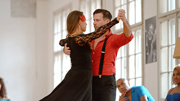 istock Elegant Tango Dance Rehearsal With Graceful Moves in Bright Studio 2218233431