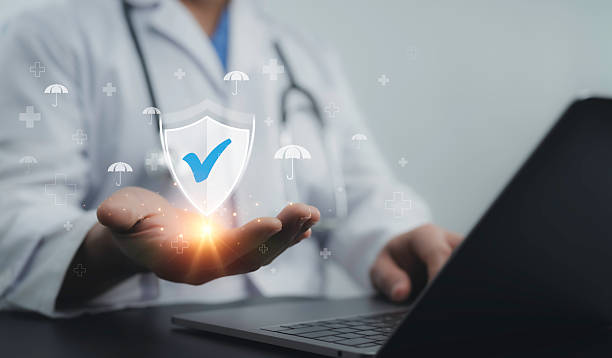 istock Doctor glowing shield icon with a checkmark, symbolizing healthcare security and quality assurance. Medical protection, digital health verification and trusted telemedicine solutions. Health insurance 2218238757