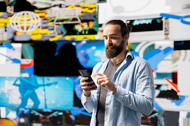 istock Young modern person focused on smartphone app and scrolling on social pages 2218241029