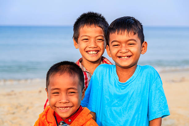 istock Cambodian little boys on the beach, Cambodia 2218250062