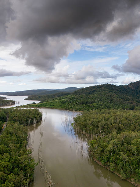 istock Majestic River Winding Through Lush Green Hills 2218251792