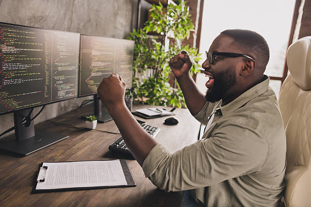 istock Profile side view portrait of attractive cheerful lucky guy expert having fun complete project startup at workplace workstation indoors 2218252637
