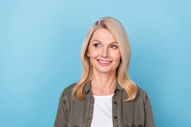 istock Photo of minded lady look empty space guess strategy start up development isolated blue pastel color background 2218254189