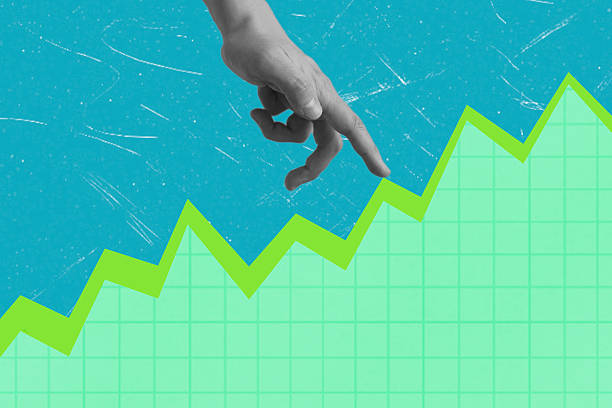 istock Hand pointing at growing graph trend in a modern design, showcasing positive financial growth and success 2218256224