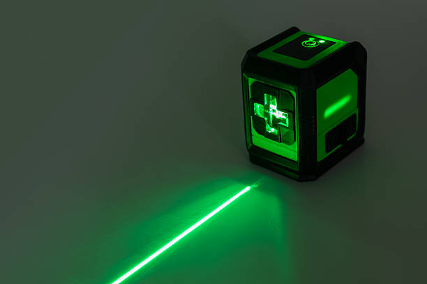 istock Green Laser level turned on in a dark room 2218258117