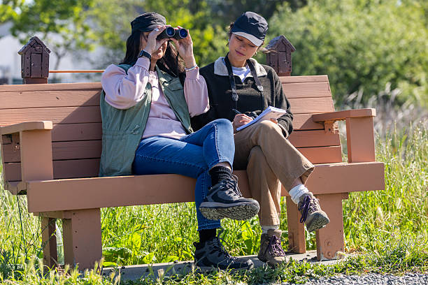 istock Mother and Daughter Birding Together 2218263626