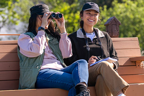 istock Mother and Daughter Birding Together 2218263628