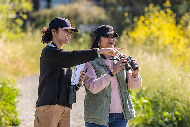 istock Mother and Daughter Birding Together 2218263641