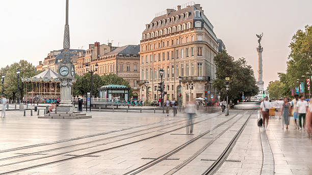 istock Triangular building and modern tram at Place de la Comedie timelapse, Bordeaux, France 2218265302