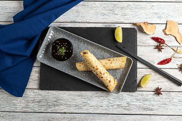 Delightful Crepes With Dipping Sauce and Garnishes
