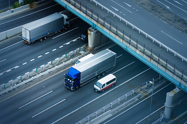 istock Freight Semi-Truck Driving on Tokyo Expressway Under Overpass 2218270835