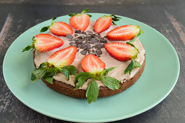 istock Oatmeal chocolate cake with yogurt, strawberry and shaved chocolate 2218272449