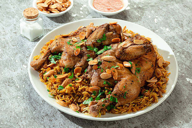 istock Grilled chicken plate served with biryani rice and nuts 2218272900