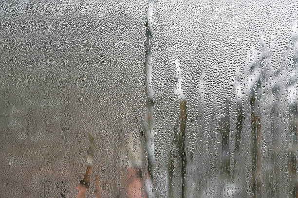 istock drops on the window. wet glass 2218279015