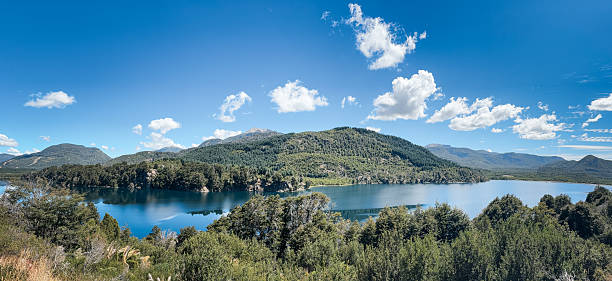 istock Panoramic lake and forest landscape with blue skies 2218281551