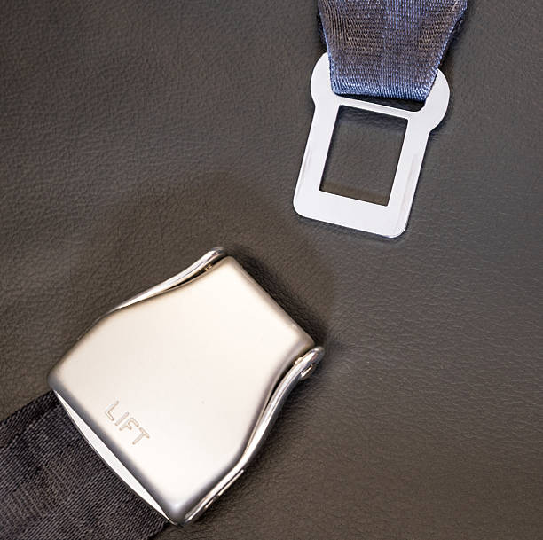 istock Airplane safety belt close-up 2218282282