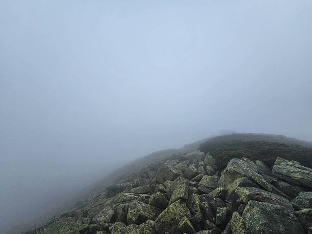 istock Misty Summit Secret in the Clouds 2218282851