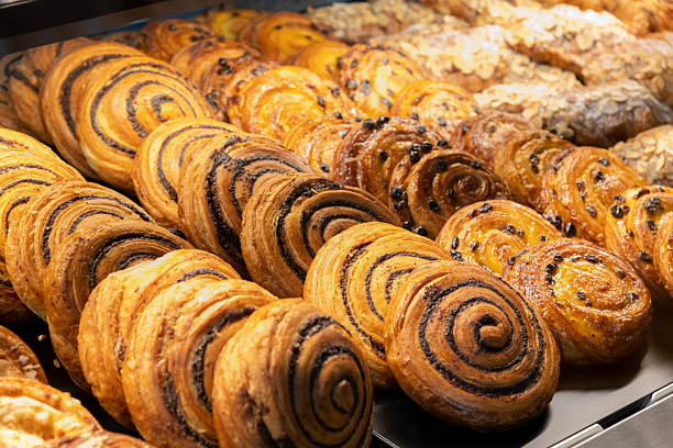 istock Delightful selection of fresh pastries at a bakery display 2218283659