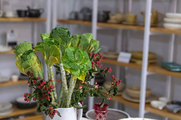 istock Unique decorative arrangement featuring cabbages and berries in a store setting 2218284810
