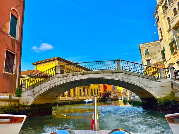 A view of Venice, Italy from the back of a water taxi