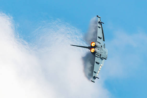 Nuremberg, Germany - 25th May 2025: Close-up of a grey military jet. Focus on the nose, cockpit, and wings, with \