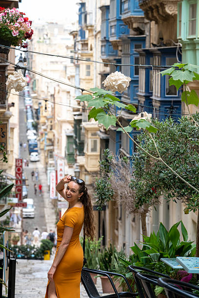 istock Woman explores narrow streets, Birgu, Valetta 2218292525