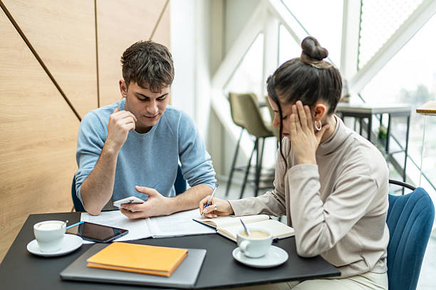 istock Young students studying and feeling stressed at the coffee shop 2218292855