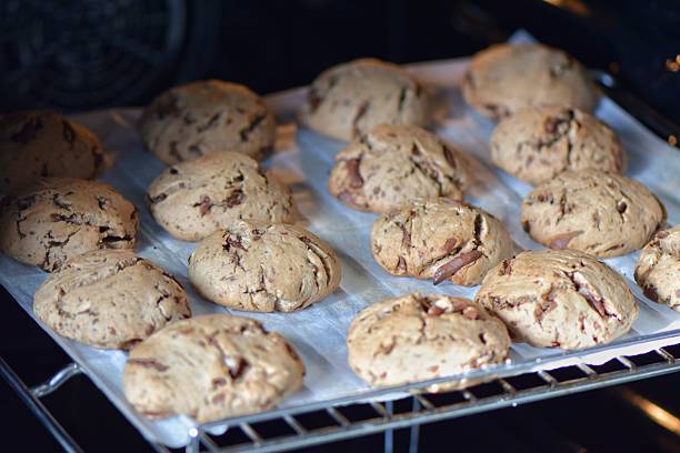 istock Freshly Baked Chocolate Chip Cookies in Oven 2218292977