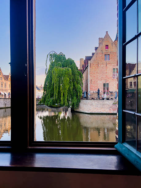 The Belgian city of Bruges with its magnificent medieval canal side buildings. Bruges is also known as the Venice of northern Europe because of its canals. The city is a Unesco World Heritage Site.