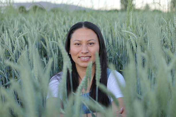 istock Woman in a wheat field 2218299776