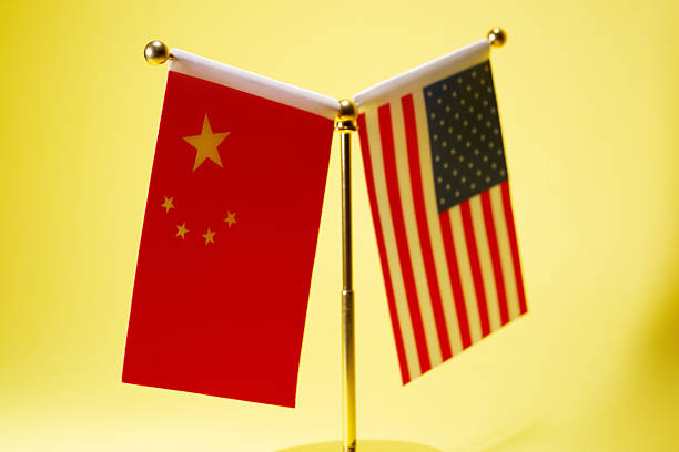 American and Chinese flag pair on desk