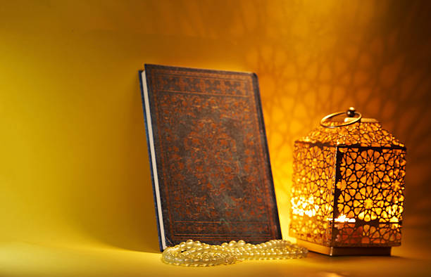 istock arabic lantern holy koran andprayer beads against yellow background 2218301813