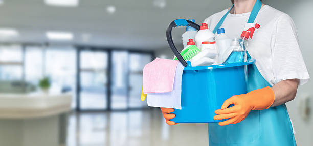 istock Cleaning service worker prepares for daily tasks 2218303045