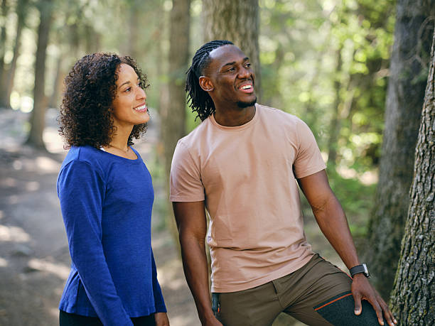 istock Young Couple on a Day Hike in the Forest 2218308395