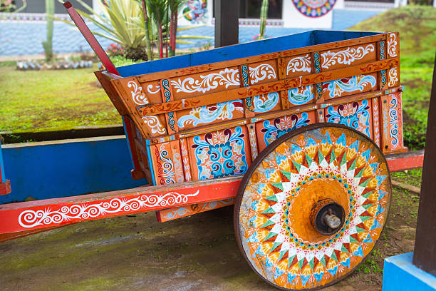 A set of open paint cans in a workshop in Sarchí, where artisans craft the vivid designs seen on Costa Rica’s iconic hand-painted ox carts. Each color is chosen with care to reflect tradition and local style.