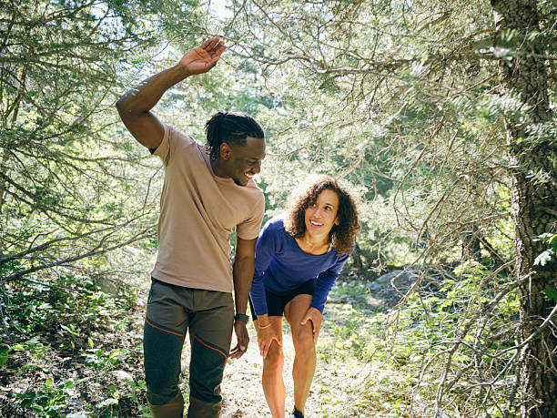 istock Young Couple on a Day Hike in the Forest 2218308642